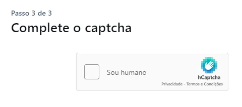 Uma página que diz passo 3 de 3, Complete o captcha. Um pequeno quadrado branco do lado do texto "Sou humano." Uma marca que diz hCaptcha. Links para Privacidade e Termos e Condições.