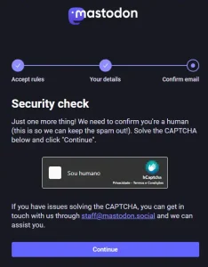 Uma página escura com o título "Security check," e um captcha, um retângulo com o rótulo "sou humano" e um quadrado branco ao seu lado esquerdo. Um botão "Continue" no rodapé da página.